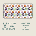 Tubie tape shown on a light beige background, with text below reading 'CUT TO ANY SHAPE', 'SHEET SIZE W-10CM X H-20CM', and a scissors icon. The top panel shows a repeating pattern of smiling pumpkins, ghosts, ghosts in purple witch hats, and pale blue ghosts on a white base.