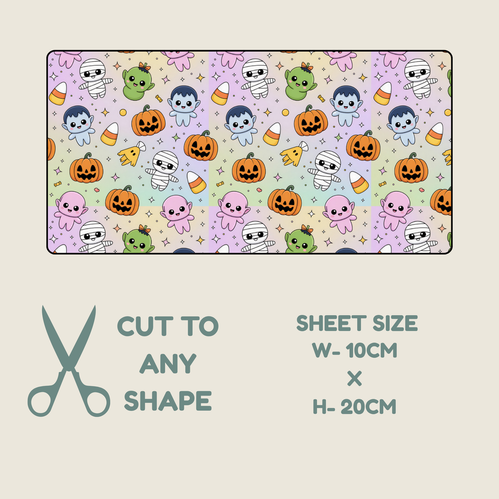  Tubie tape with a repeating Halloween print shown on a light beige background, with text below reading 'CUT TO ANY SHAPE' and 'SHEET SIZE W-10CM x H-20CM'. The pattern features cartoon pumpkins, ghosts, mummies, and candy corn in pastel colors.
 