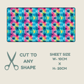 Tubie tape with a colorful tie-dye patterned fabric sheet shown on a light beige background, with text below reading 'CUT TO ANY SHAPE' and 'SHEET SIZE W-10CM x H-20CM', plus a scissors icon.