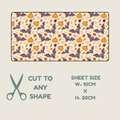 Tubie tape with a repeating  Halloween design, shown above a text panel that reads 'CUT TO ANY SHAPE' and 'SHEET SIZE W-10CM x H-20CM'. The pattern features orange pumpkins, gray bats, and autumn leaves on a cream background.