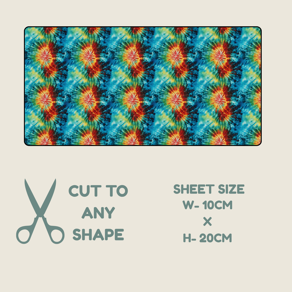 A tubie tape swatch showing a colorful tie-dye pattern with blue, green, yellow, and orange-red starburst motifs, displayed on a light beige background with text reading 'CUT TO ANY SHAPE' and 'SHEET SIZE W-10CM x H-20CM' plus a scissors icon.