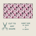 Tubie tape with a repeating Halloween-themed print of black cats, pink pumpkins, and white ghosts on a light pink background, shown with text indicating sheet size 10cm by 20cm and scissors icon for cutting.