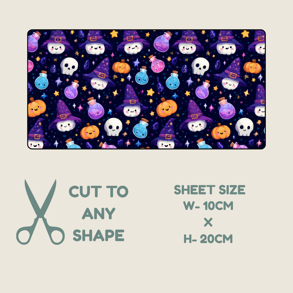 Tubie tape with a repeating Halloween pattern of cartoon skulls, witch hats, pumpkins, stars, and colorful bottles on a dark background, shown on a light beige backdrop. Text below reads 'CUT TO ANY SHAPE' with scissors icon, and 'SHEET SIZE W-10CM x H-20CM'.