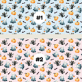 Two Halloween-themed repeating pattern swatches labeled #1 and #2. The top pattern #1 has a light blue background with black cats, white ghosts, orange pumpkins, and small black bats.
 The bottom pattern #2 has a light pink background with black cats, white ghosts, orange pumpkins, and small black bats.