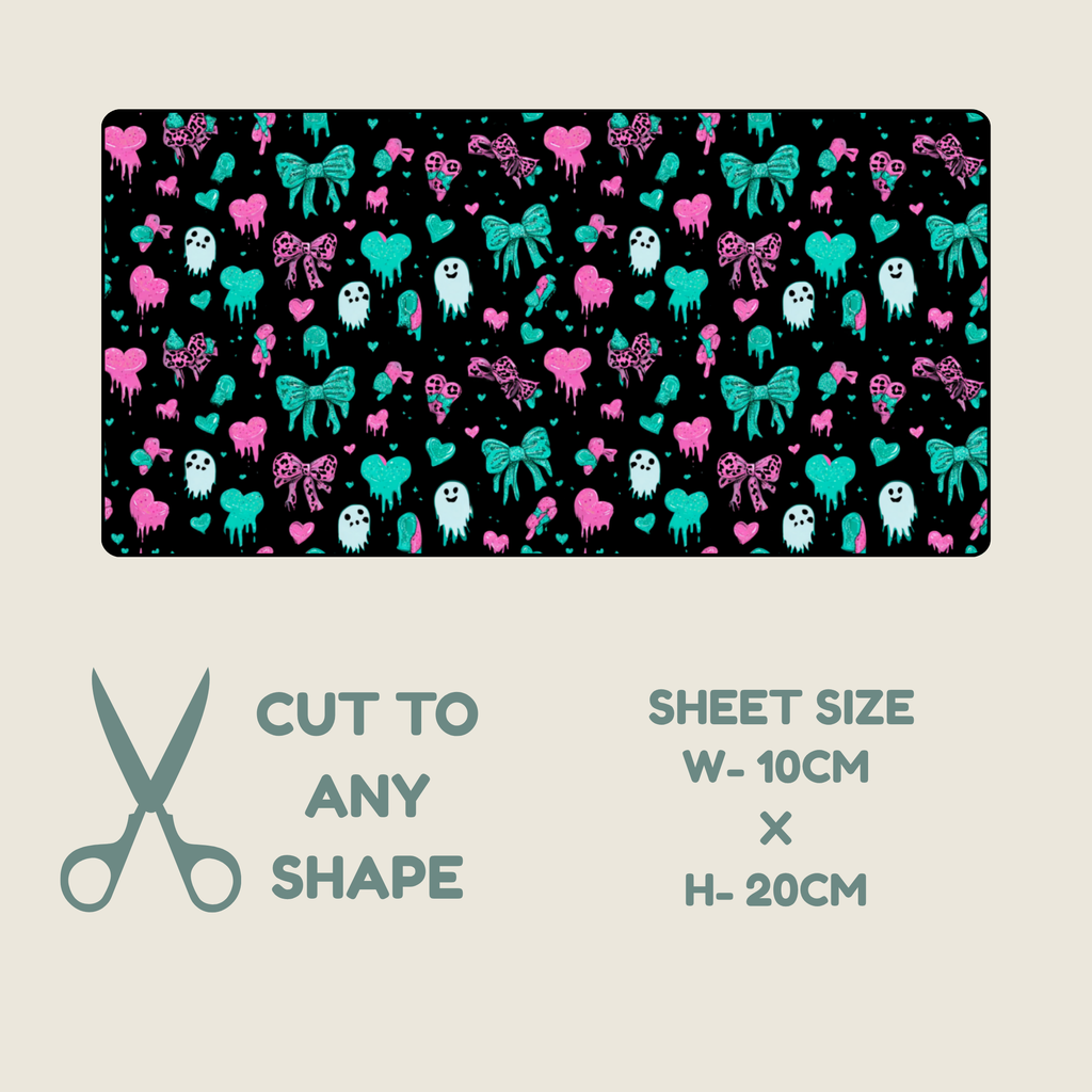 Tubie tape with a repeating ghost, bows and hearts in hot pinks and teal colours on a black background