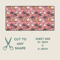  Tubie tape with a pink Halloween pattern featuring ghosts, hearts, bats, and candy, shown on a light beige background with text indicating sheet size 10cm x 20cm and a scissors icon saying cut to any shape.