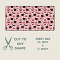 Tubie tape shown on a light beige background, with text below reading 'CUT TO ANY SHAPE', 'SHEET SIZE W-10CM x H-20CM', and a scissors icon. The sheet has a pink Halloween-style print with black cat faces, pumpkins, bats, and small decorative motifs.