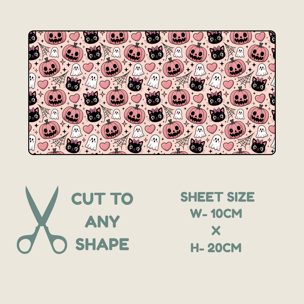 Tubie tape with a repeating Halloween pattern of pumpkins, ghosts, cats, and hearts on a light beige background, shown with text below reading 'CUT TO ANY SHAPE', 'SHEET SIZE W-10CM x H-20CM', and a scissors icon.