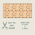 Tubie tape pattern preview with a repeating Halloween design on a warm beige background. The pattern shows small white skulls wearing purple witch hats, black witch hats, orange broomsticks, and orange candy corn.
