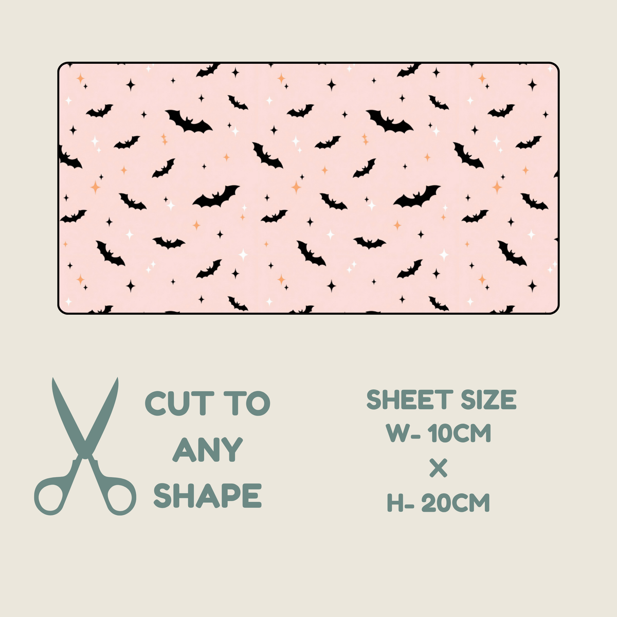 A rectangular tubie tape with a light pink background and a repeating Halloween-style print of black bats, small orange stars, and white stars, shown on a beige background with text reading 'CUT TO ANY SHAPE' and 'SHEET SIZE W-10CM X H-20CM'.
