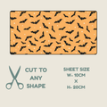 A rectangular sheet of orange tubie tape with a repeating black bat print and small white star accents, shown on a light beige background with text reading 'CUT TO ANY SHAPE' and 'SHEET SIZE W-10CM x H-20CM'.