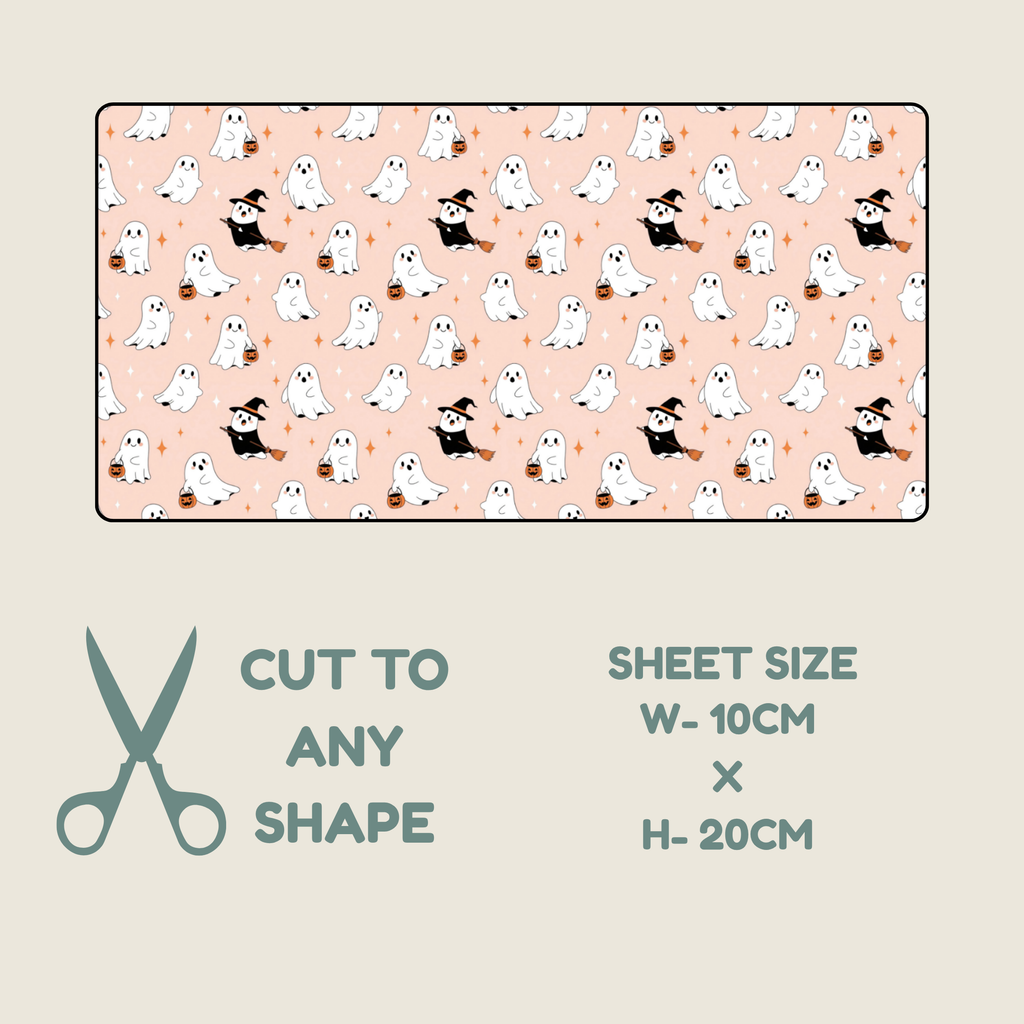 A product graphic showing a tubie tape sheet of Halloween-themed patterned craft vinyl or fabric. The pattern features cute white cartoon ghosts and witch characters on a light peach-pink background.
