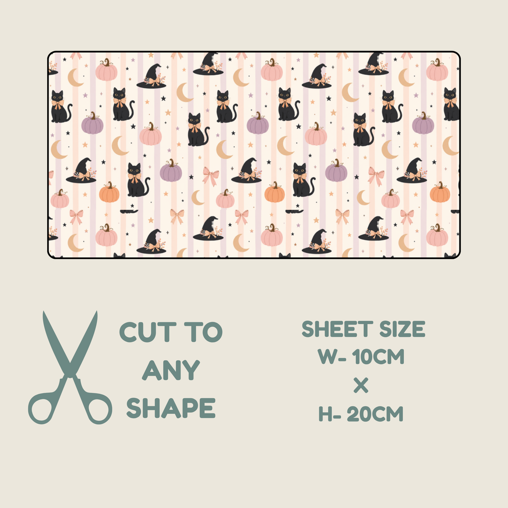 Hypoallergenic tubie tape with a Halloween-themed print of black cats, pumpkins, witch hats, and moons on a cream and pink striped background, shown with text indicating sheet size 10cm x 20cm and the option to cut to any shape.