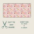 A rectangular fabric tubie tape with a repeating autumn pattern of pink and orange pumpkins, green vines, and gray starbursts on a pale pink background, shown above a beige panel with text reading 'CUT TO ANY SHAPE', 'SHEET SIZE W-10CM x H-20CM', and a scissors icon.
