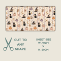 A Halloween-themed tubie tape sheet with a repeating print of witch cats, pumpkins, and moons on a beige striped background, shown with text indicating sheet size 10cm x 20cm and the option to cut to any shape.