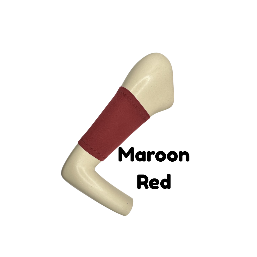 Cotton jersey armband in maroon red colour. picc line cover is displayed on a mannequin arm. the words maroon red to indicate colour