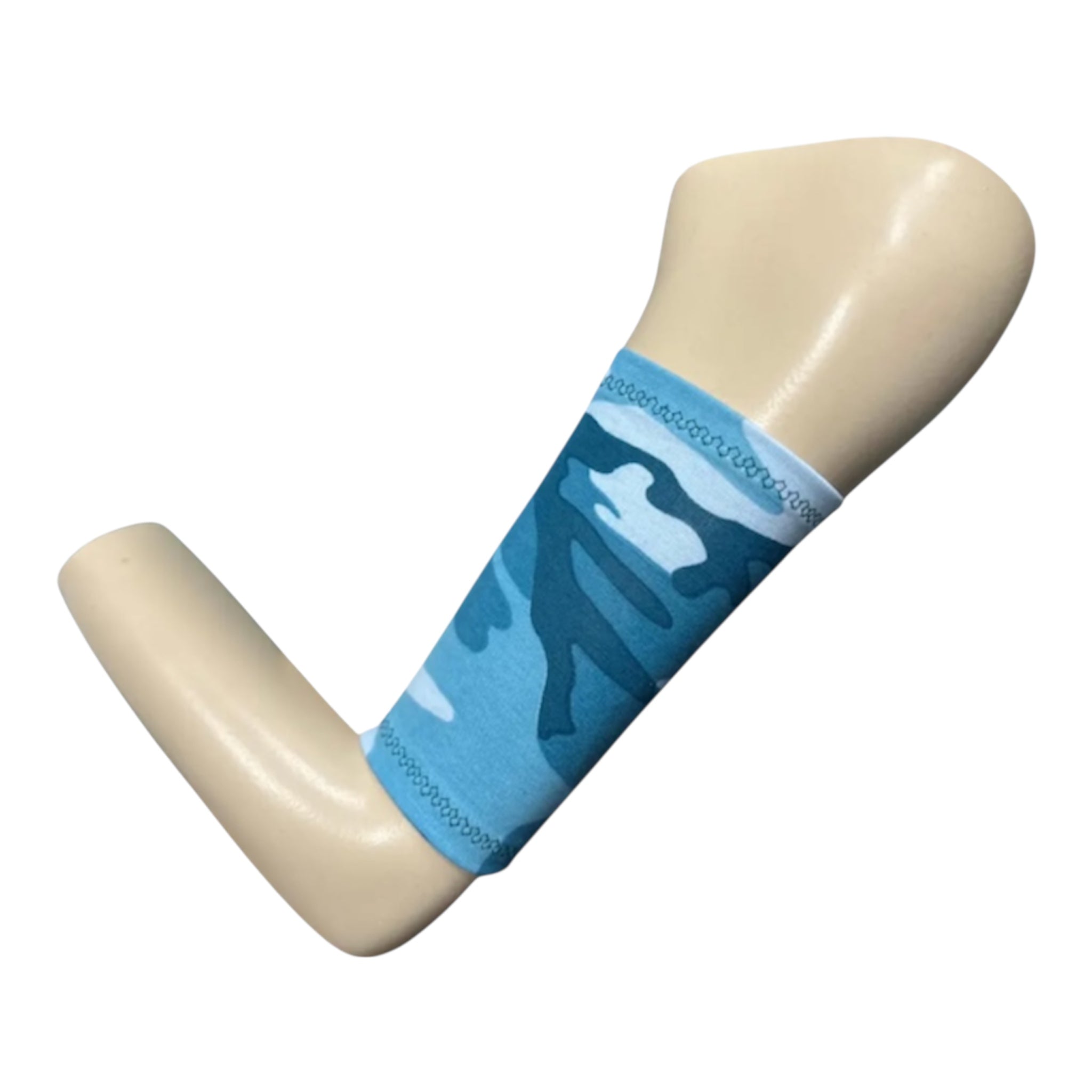 A blue mix camouflage print picc line cover displayed on a manequinn arm. The armband is made from cotton jersey fabric