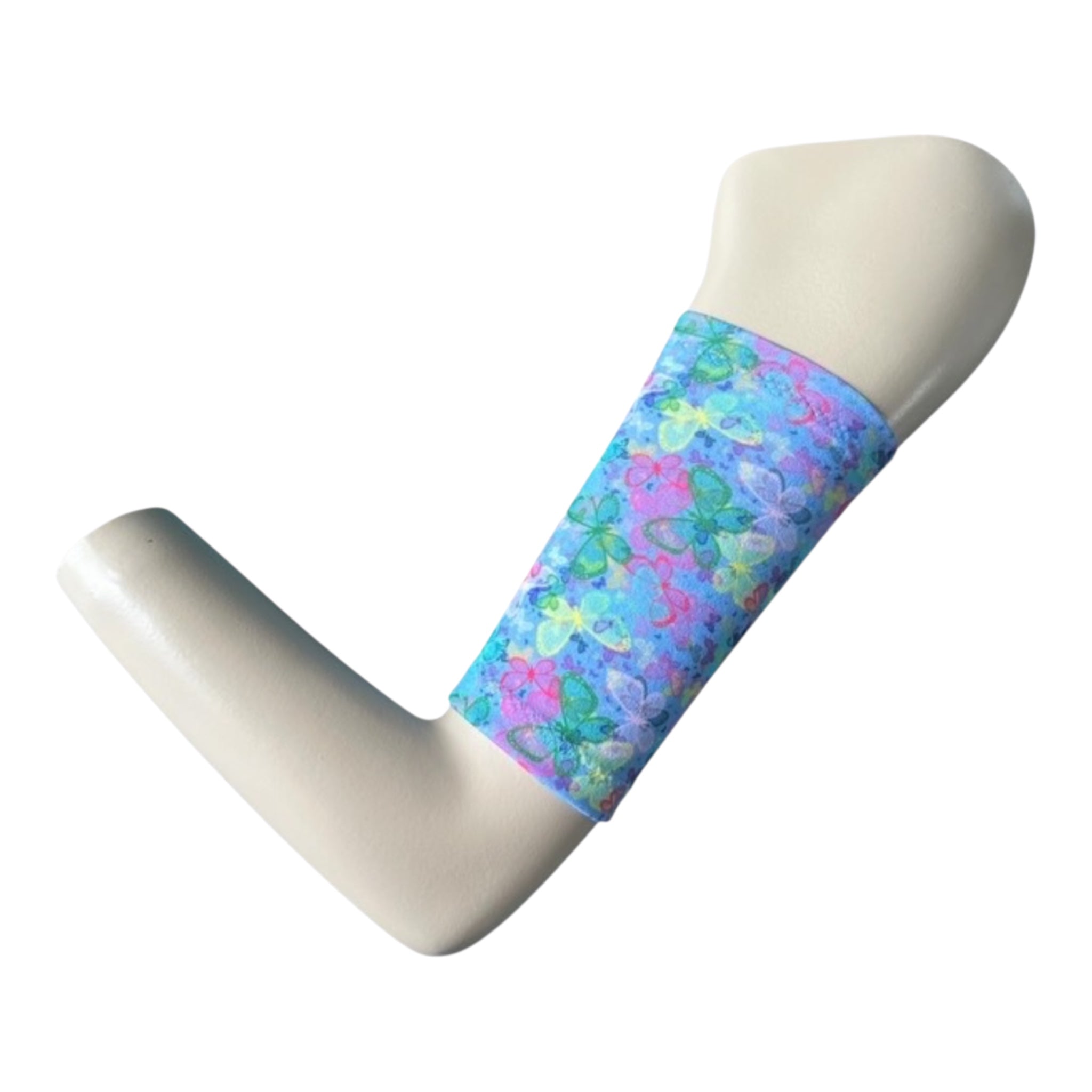 A armband on the bicep  of a mannequin arm . The band has a blue background with pink , yellow and green butterfly print. 