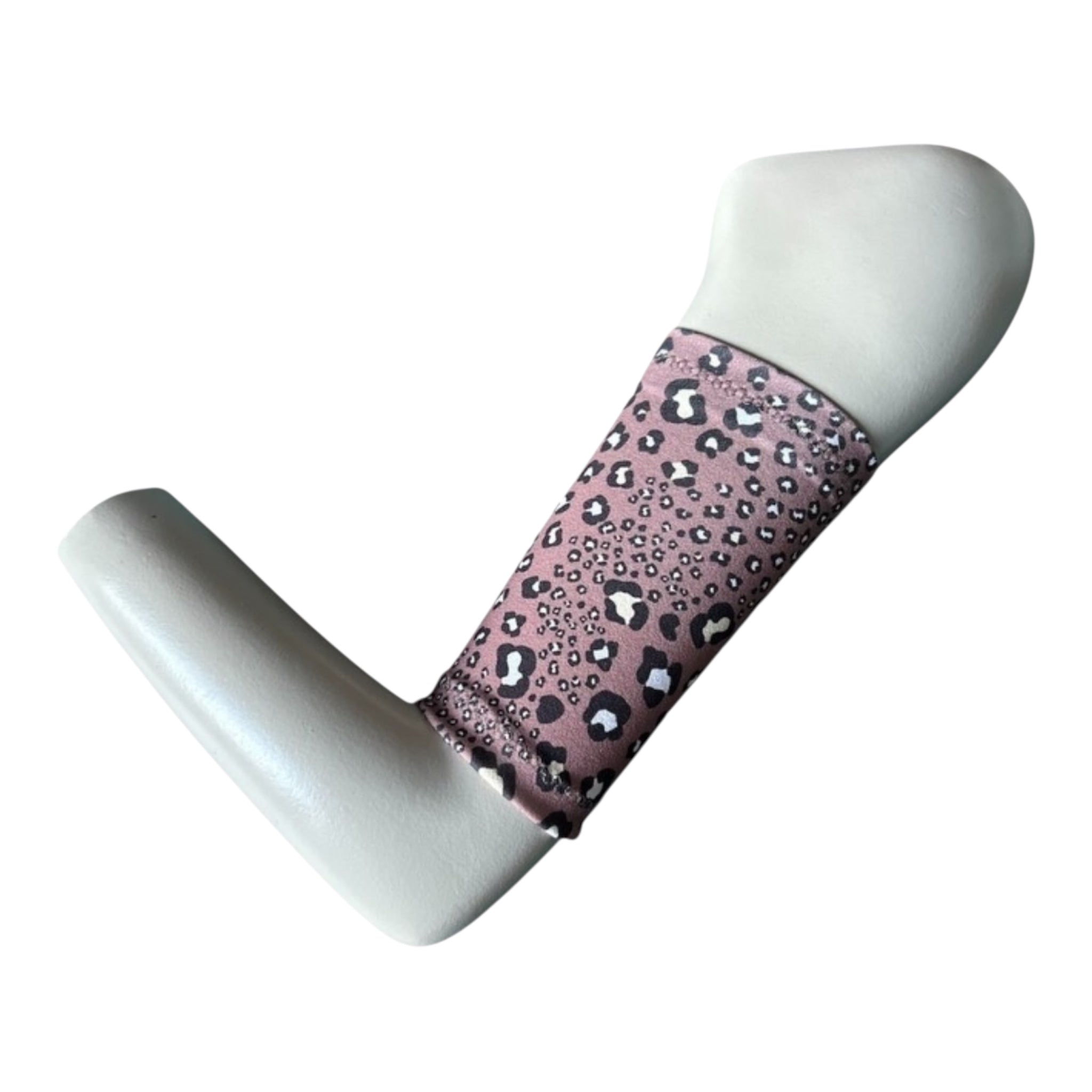 A Picc line cover displayed on a mannequinn arm. The armband is brown base with a black and white leopard print.